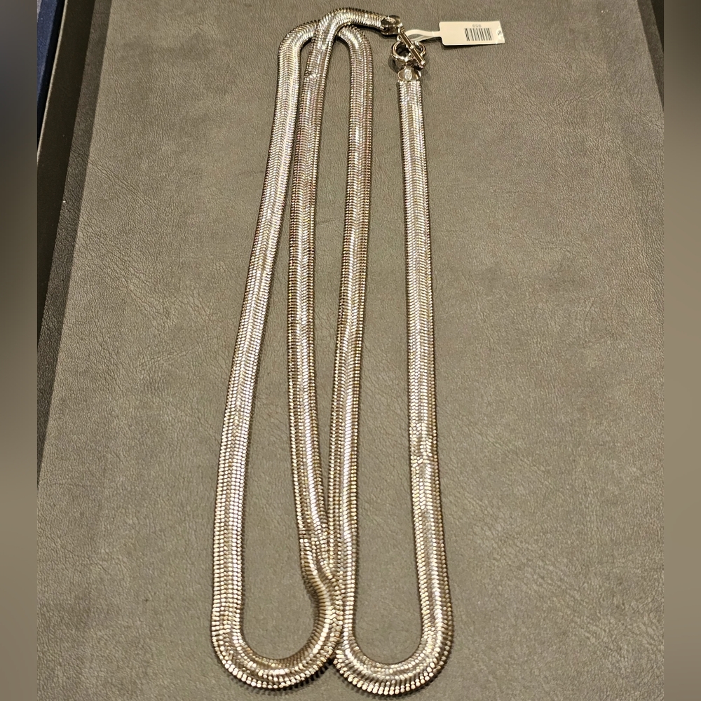 925 sterling silver snake chain. Toggle closure, made in Italy. Approx. 40".